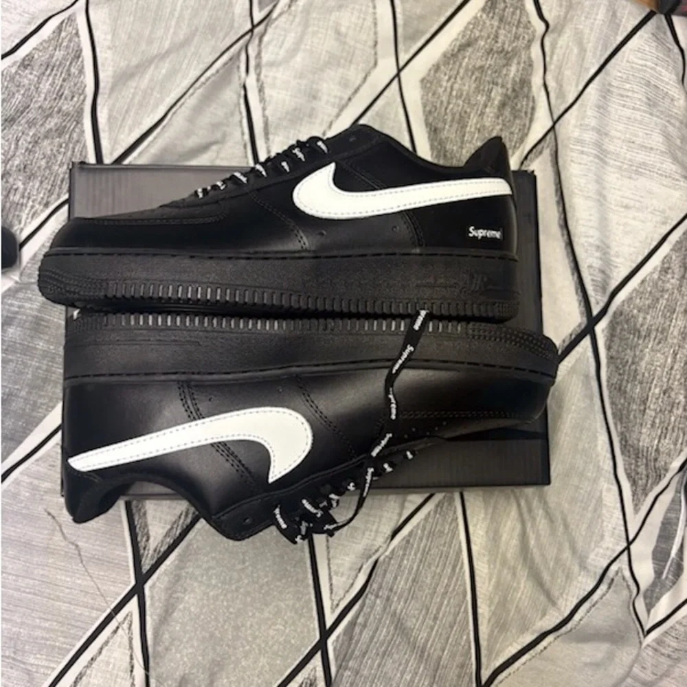 Supreme Black Sneakers with White Swoosh